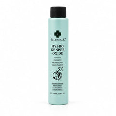 A bottle of Blossom K Hydro Genper Oxide 6% professional salon product in a light mint green color with a black cap, on a white background.