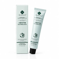 Blossom K Permanent Colour Creme tube and matching box packaging, featuring a light mint green design with black text and a green cross logo, set against a plain white background.