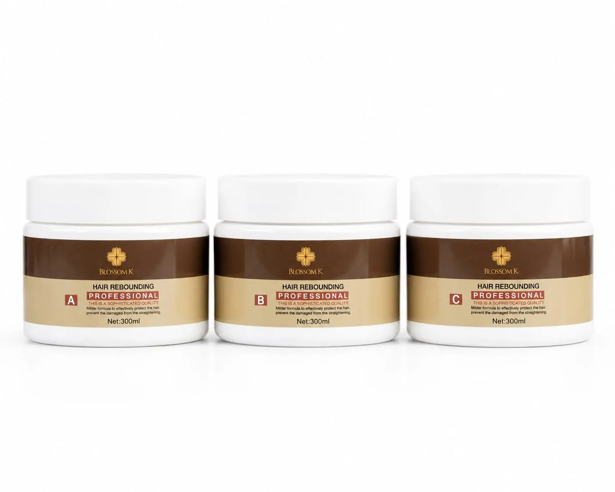 Three white plastic jars of Hair Resounding Professional hair restoration treatment arranged side by side on a white background.